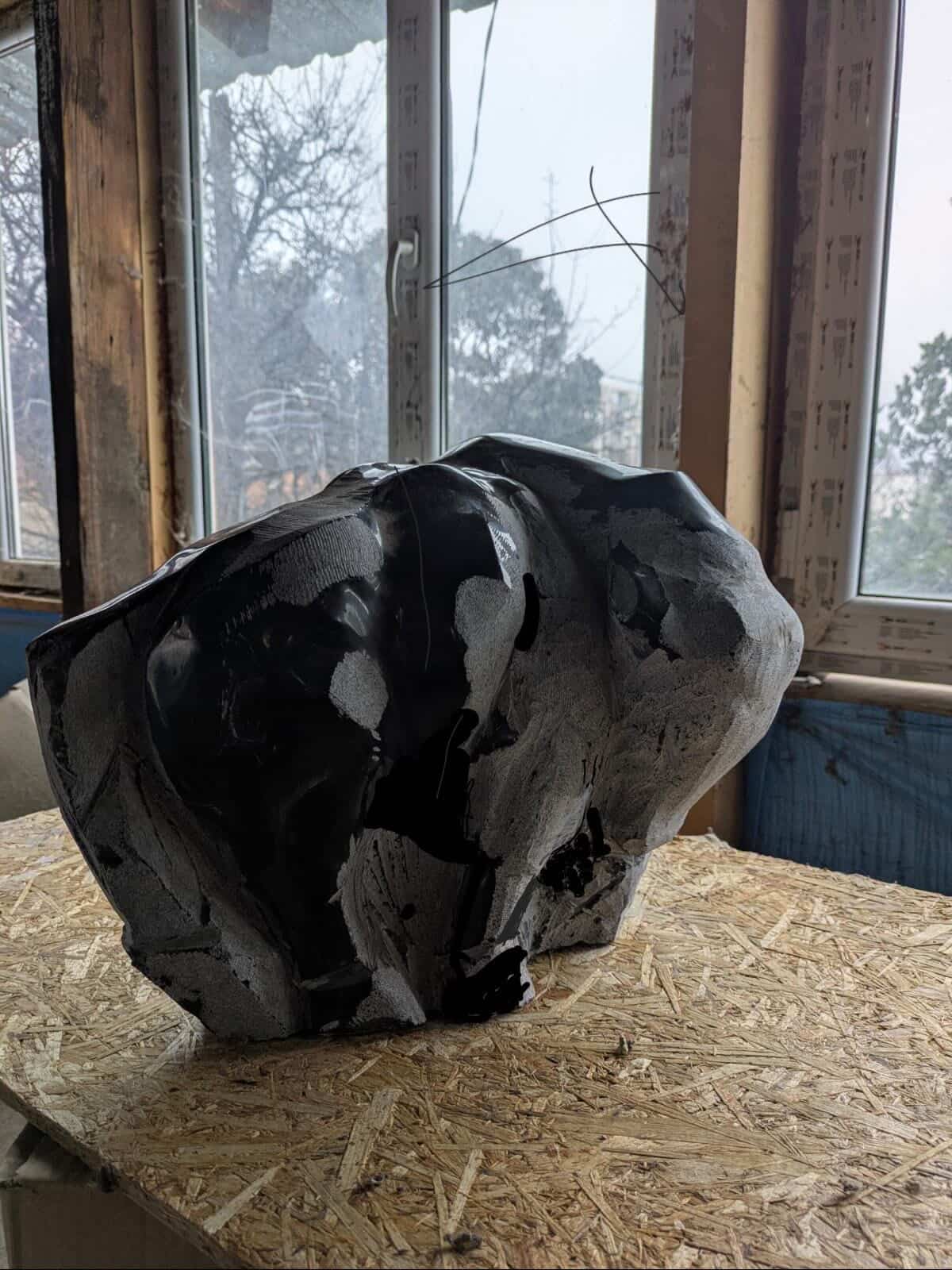 Black Bull — obsidian sculpture by Irakli Athoneli